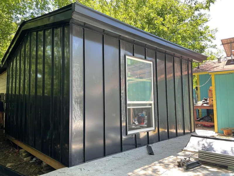 Black standing seam metal wall panels for Metal Roof Installation in Covington